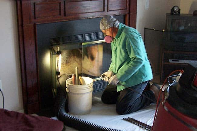 Inspect and Clean Your Chimney and Fireplace Before Using