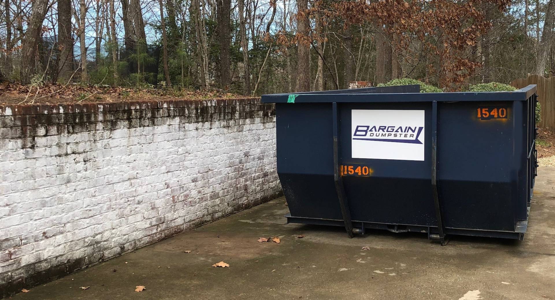 a Bargain Dumpster in a driveway